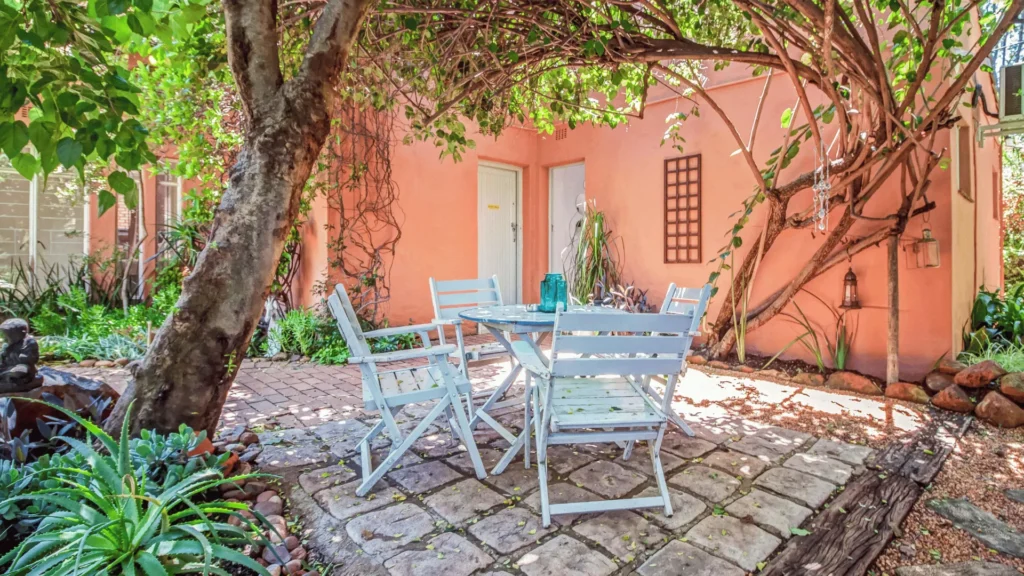 Courtyard with blue garden chairs